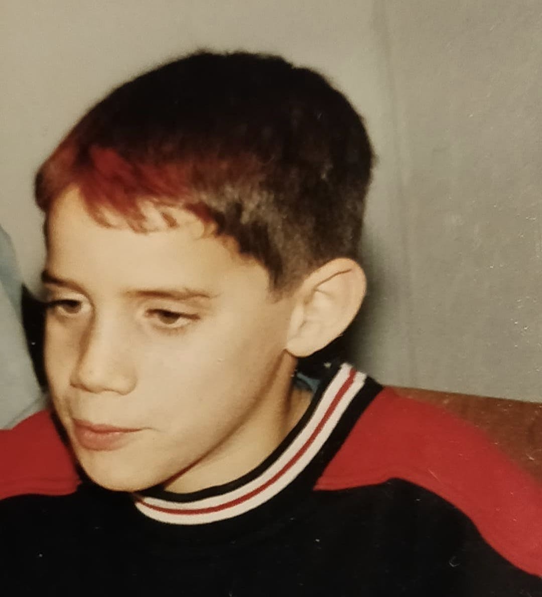 Louis Grenier as a kid who challenged conventions even from a young age.